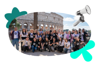 The 2026 Italy Youth Ambassadors stand in front of the Colosseum